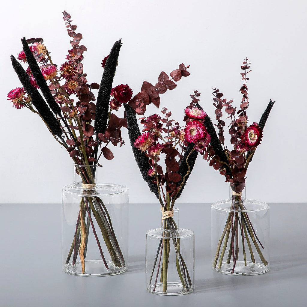 Set of dried flowers with glass vases