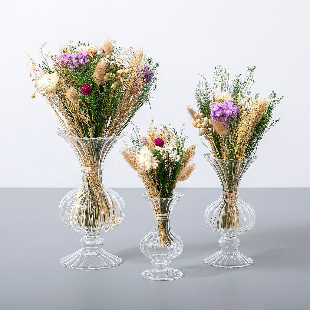 Set of dried flowers with glass vases