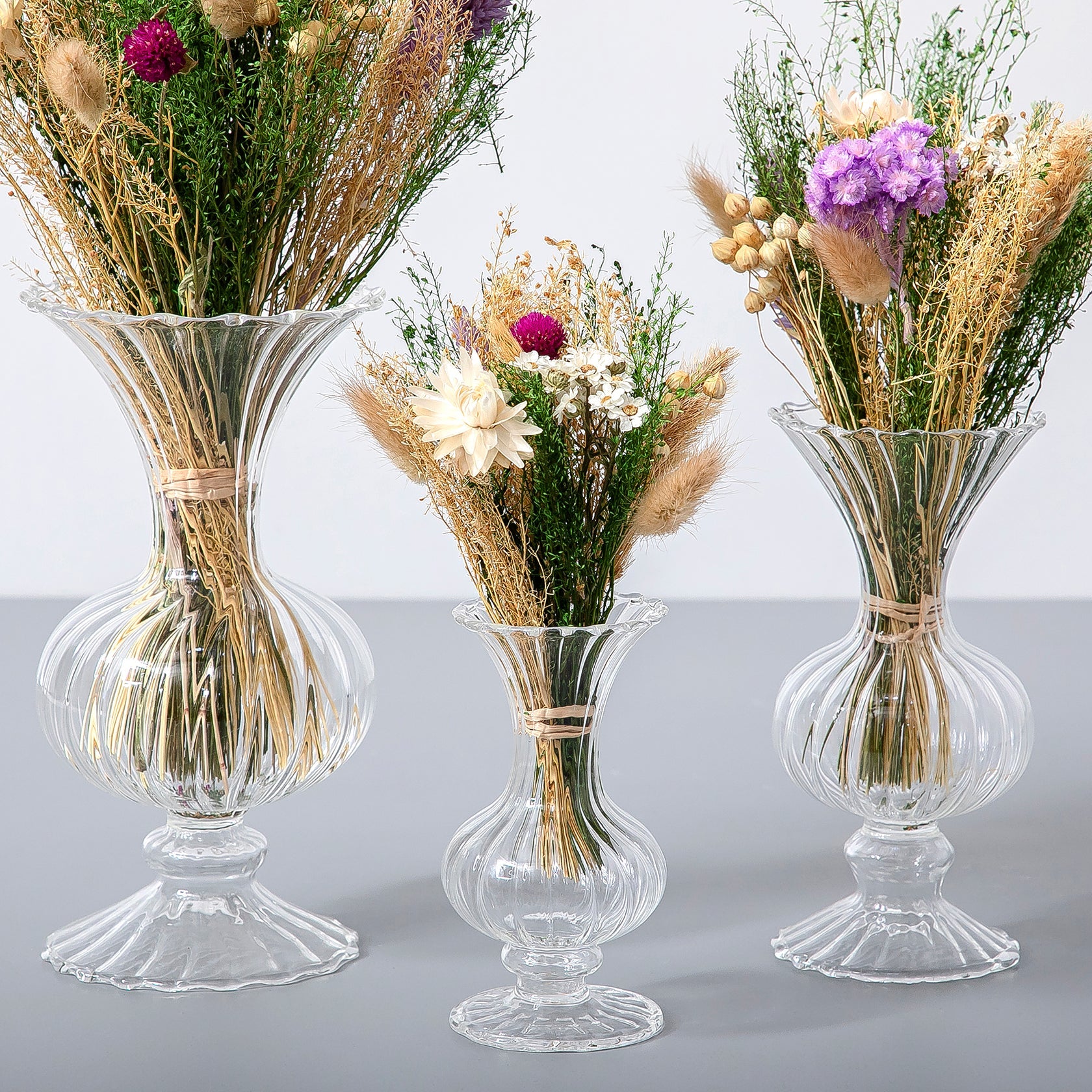 Set of dried flowers with glass vases