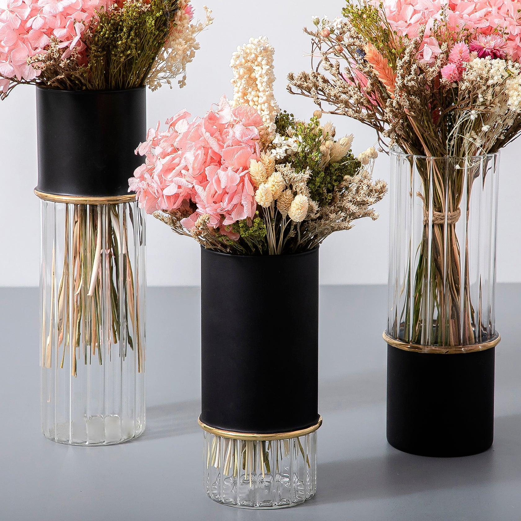 Set of dried flowers with glass vases