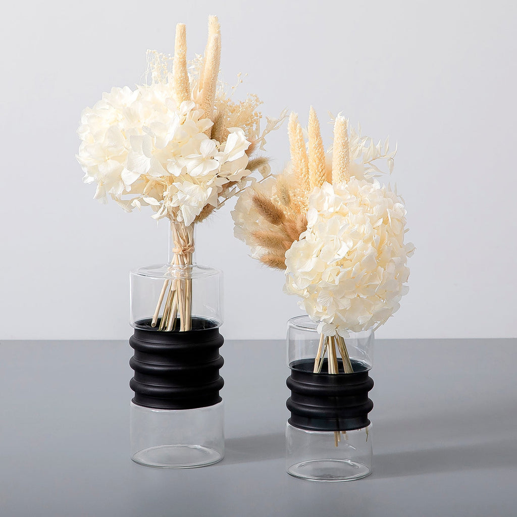Set of dried flowers with glass vases
