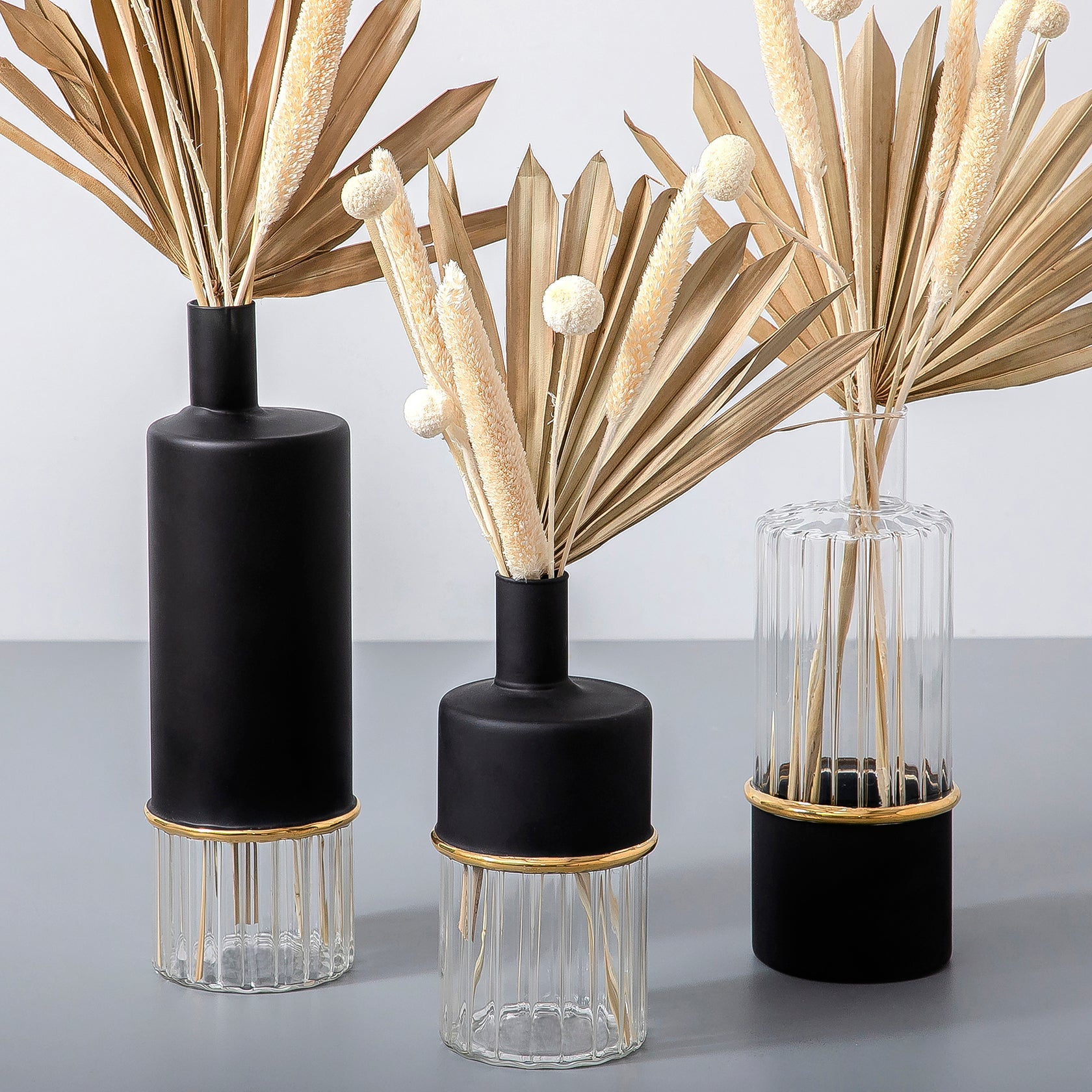 Set of dried flowers with glass vases